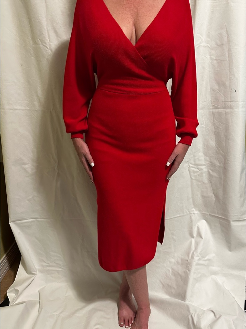 Bright red heavy knit form fitting red dress with slits on the sides fits